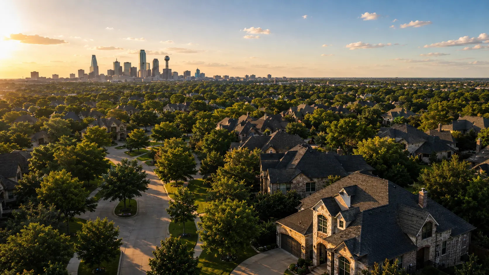 Aerial view of a Dallas-area residential neighborhood with the downtown skyline in the distance